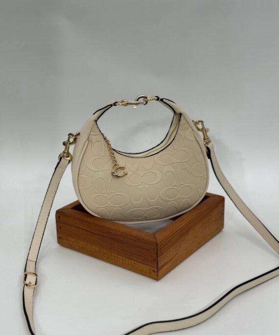 Coach Gofraj ay modeli orta boy bej çanta