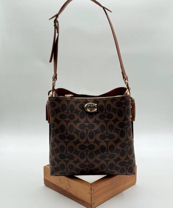 Coach monogram kilitli büzgülü kahve taba çanta