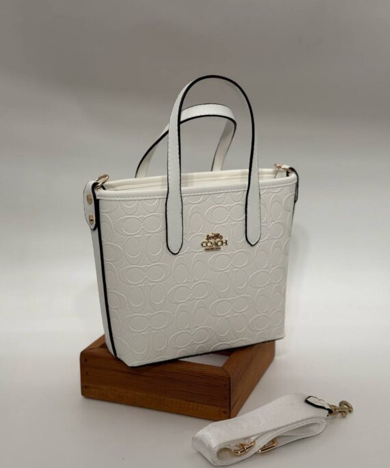 Coach Gofraj orta boy kova beyaz çanta