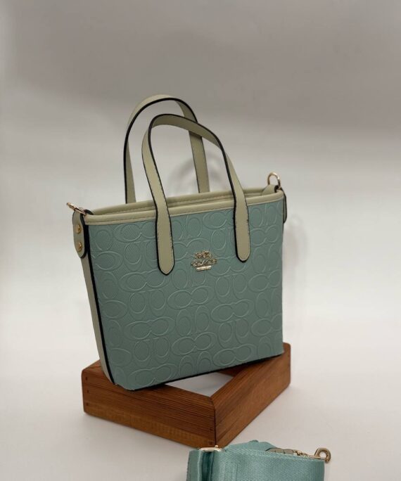 Coach Gofraj orta boy kova mint çanta