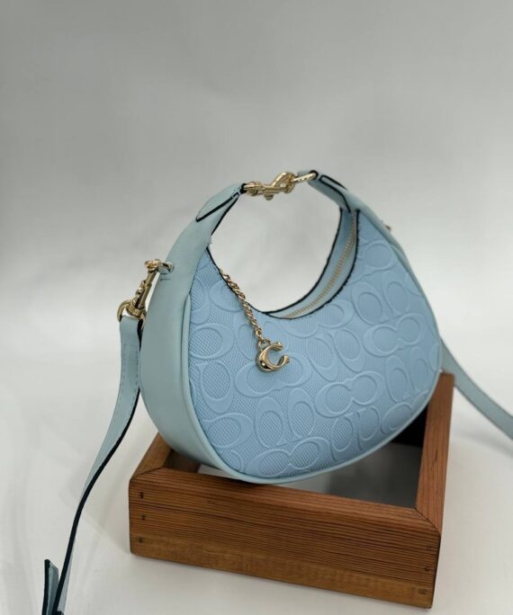 Coach Gofraj ay modeli orta boy mavi çanta